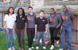 Group of scholars from 2013 posing on Princeton's campus